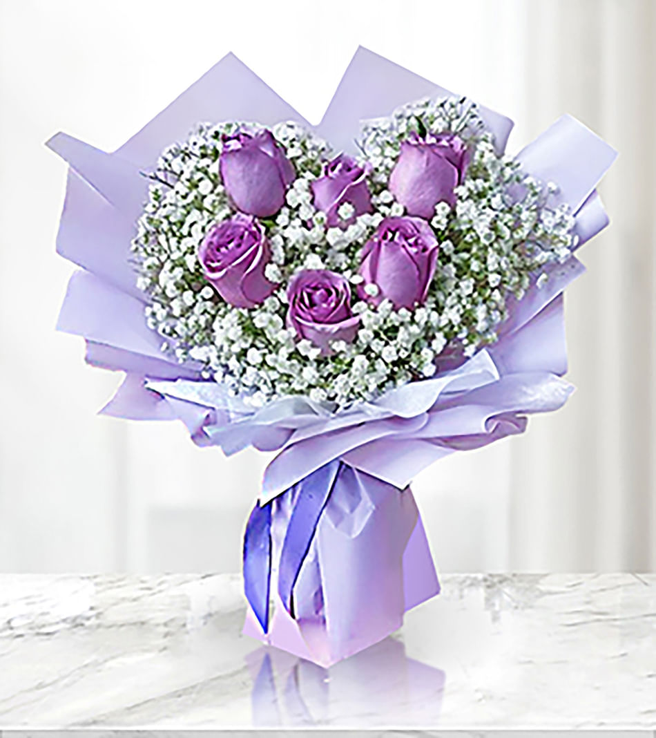 https://cdnnew.igp.com/f_auto%2Cq_auto%2Ct_pnopt19prodlp/products/p-charming-purple-rose-bouquet-202039-m.jpg