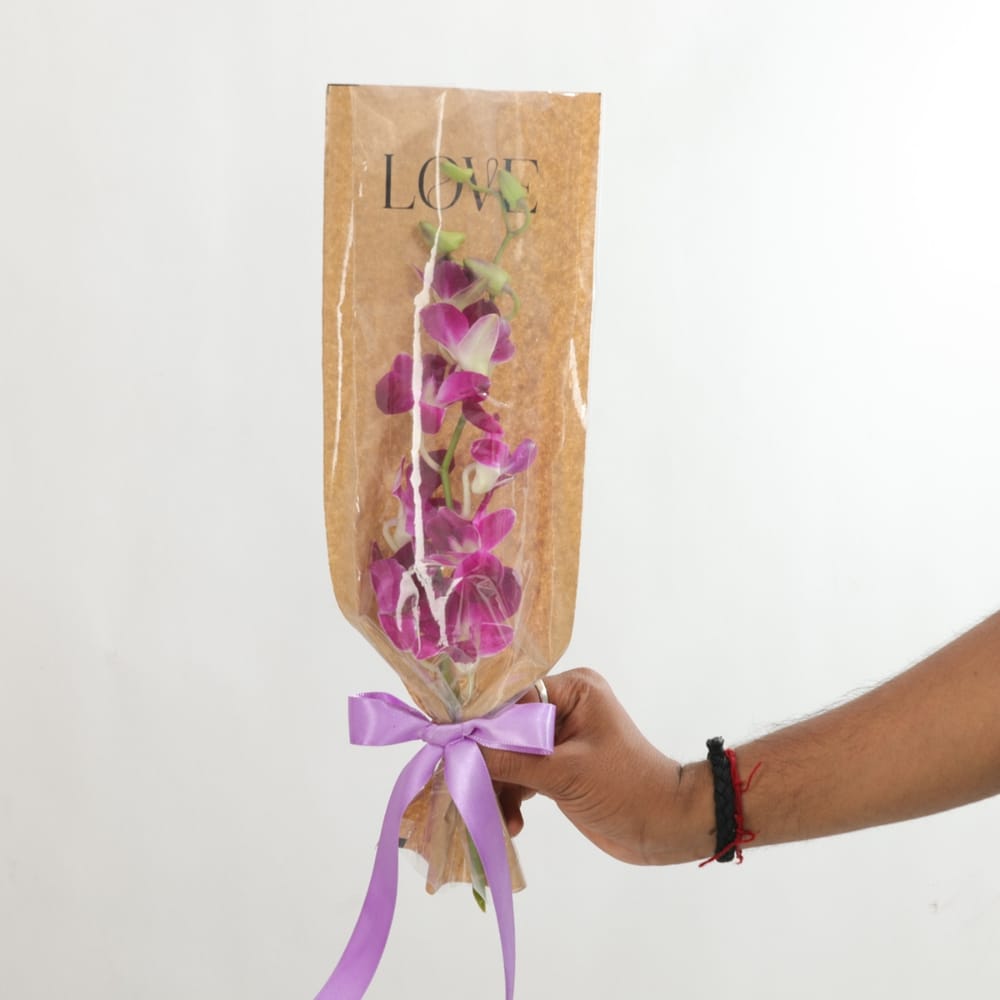 Buy/Send IGP Single Purple Orchid Bouquet Online | IGP | JVS1410393