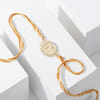 Buy Alluring Sun Rakhi And Chocoate Combo
