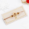 Buy Auspicious Ganesha Rudraksha Rakhi With CZ Stones