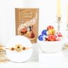 Blessed Ganesha Rakhi And Chocolates Combo Online