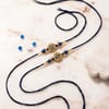 Buy Blue Floral Rakhi and Kaju Katli Combo