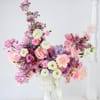 Shop Blush Floral Arrangement In Urn Planter
