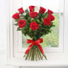 Gift Bouquet of 10 Red Roses with Chocolate Cake (Half Kg)