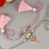 Gift Charming Pearls And Beads Rakhi (Set of 2)