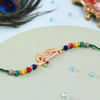 Colourful Beads Flute Rakhi Online