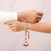 Gift Designer Ganesha Rakhi Set for Bhaiya Bhabhi with Roli Chawal