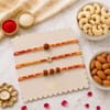 Divine Rudraksh, Om & Swastik Rakhi with Dry Fruits