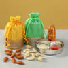 Dry Fruits in Designer Potlis with Silver Plated Puja Thali Online