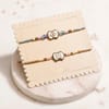 Shop Elegant Kundan with Mother of Pearl Rakhi Set of 2