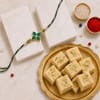 Emerald Clover Stone Rakhi with Soan Papdi Online