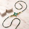 Buy Emrald Stone Rakhi with Kaju Katli