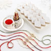 Exquisite Kundan Pearl Rakhi Set Of 4 With Kaju Katli Online