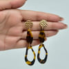 Buy Fancy Animal Print Abstract Earrings
