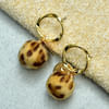 Fancy Golden Ring and Animal Print Pom Pom Earring Online