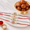 Festive Pearl Meena Rakhi Set with Gulab Jamun Online