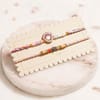 Buy Floral Peacock Rakhi and Kaju Katli Combo