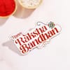 Buy Floral Peacock Rakhi with Sugar-Free Delights Hamper