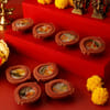 Buy Flower Shaped Clay Diyas - Set Of 8