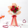 Gift Fresh Red Roses Wrapped in Peach Sheets