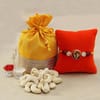Ganesha Kundan Rakhi with Cashews in Yellow Gota Work Potli and Roli Chawal Container Online