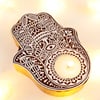 Buy Ganesha Lakshmi & Hamsa Candle Set
