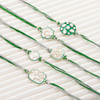 Gift Glistening Kundan Rakhi Set Of 5
