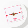 Buy Golden Peacock Rakhi with Golden Bead
