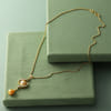 Buy Golden Pearl and CZ Pendant and Earrings Set