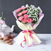 Gift Hazelnut Crunch Cake With Bunch Of Light Carnations
