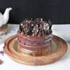 Buy Hazelnut Crunch Cake With Bunch Of Light Carnations