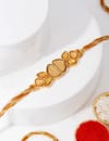Buy IGP Golden Kundan Rakhi