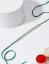 Buy IGP Green Beads Rakhi
