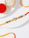 Buy IGP Stone Rakhi with Golden Beads