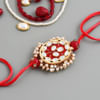 Kundan And Pearls Oval Red Rakhi Online