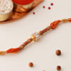 Gift Kundan Moli Rakhi with Flavoured Dry Fruits In Potli