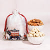 Buy Lord Ganesha & Floral Rakhi Combo With Gourmet Treats
