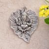 Metal Ganesha Carved on a Leaf - Wall Hanging Online