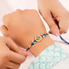 Buy Mother of Pearl Blue Floral Rakhi Set of 2