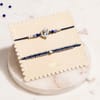Shop Om and Beaded Thread Solitaire Rakhi Set of 2