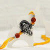 Gift Oxidized Ganesha Rakhi With Assorted Laddoos