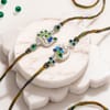 Gift Peacock Grace Raksha Bandhan Hamper with Silver-Plated Container