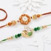 Gift Peacock Kundan Rakhis And Gulab Jamun Hamper