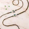 Buy Peacock Rakhis and Snickers Combo