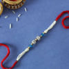 Gift Pearl Rakhi with CZ Stones & Blue Beads