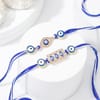 Buy Protective Evil Eye Rakhi Set with Salted Cashews