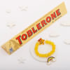 Rainbow Bracelet Rakhi With Toblerone Online