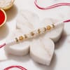 Shop Regal Kundan Pearl and Vintage Golden Rakhi - Set of 3