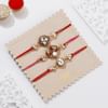 Shop Regal Meena and Kundan Rakhis-Set Of 5