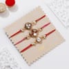 Shop Regal Meena and Kundan Rakhis-Set Of 5